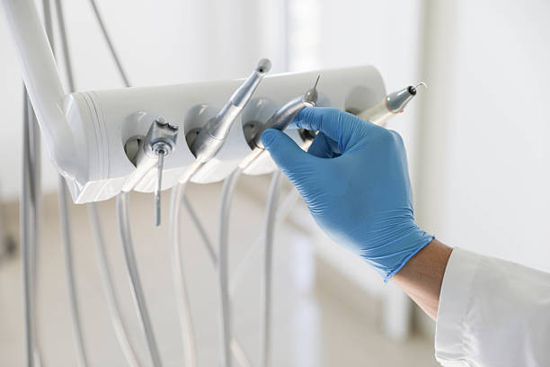 Professional Tooth Extraction technician working in Polk County County, IA
